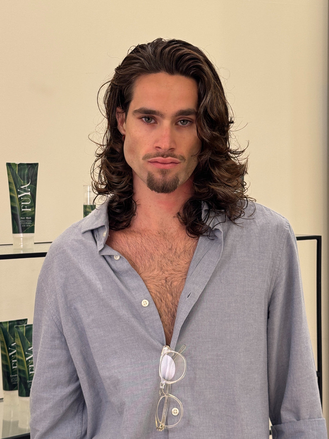 Man with shoulder-length wavy brown hair, Hair Shak Salon Miami