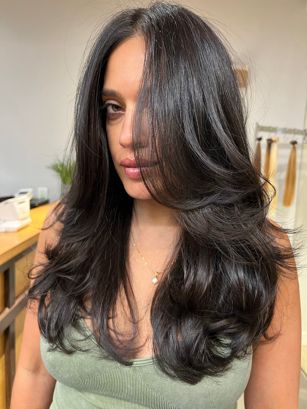 Long black hair with a bouncy blowout