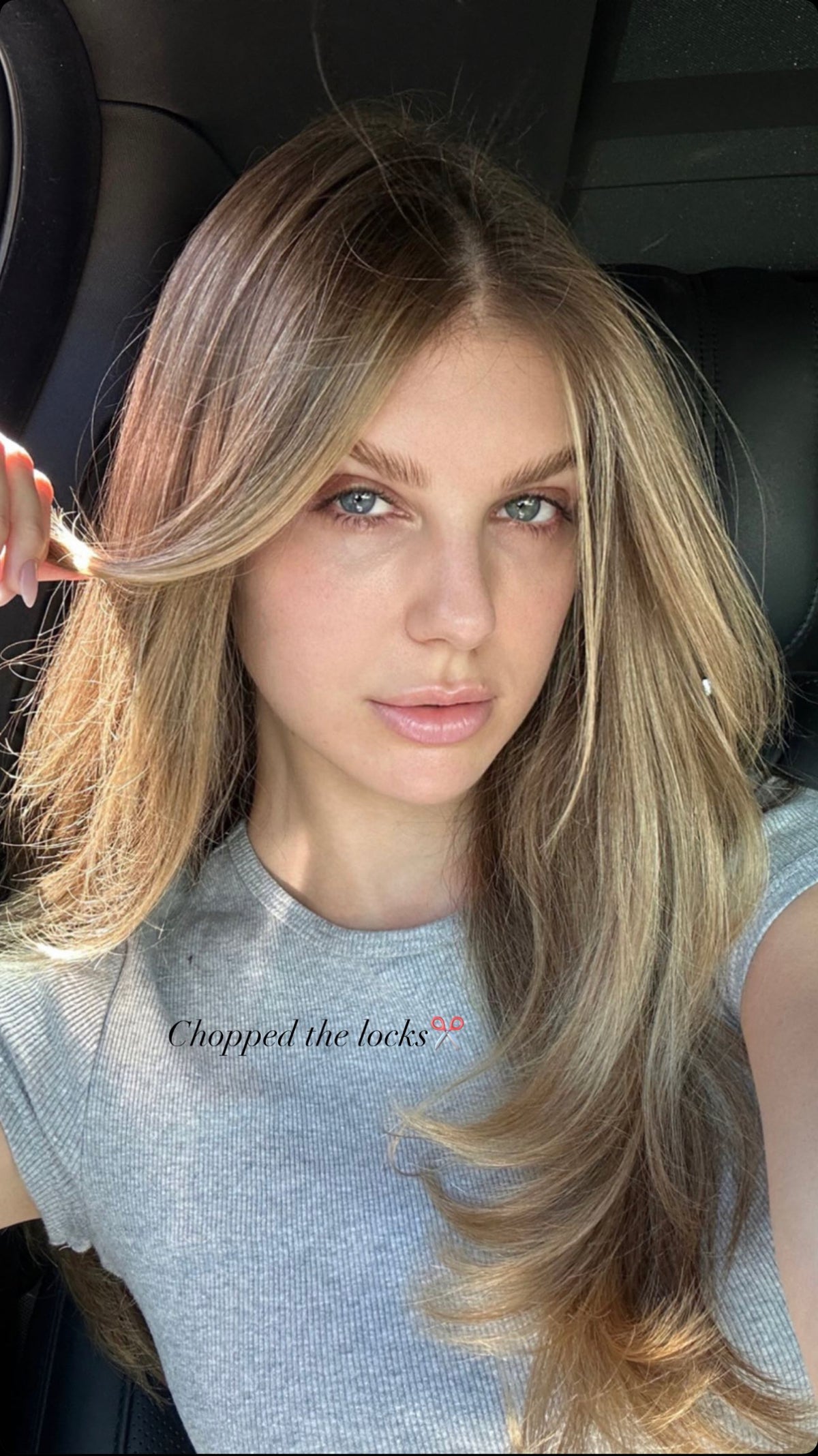 Light brown hair with blonde face-framing layers