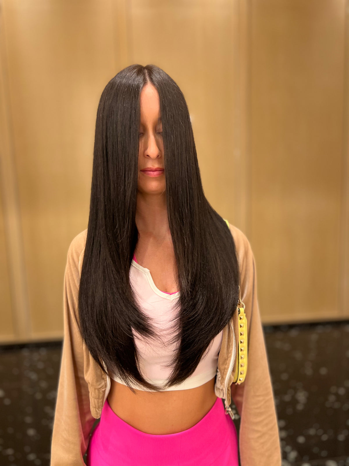 Long, straight dark brown hair after a smoothing treatment