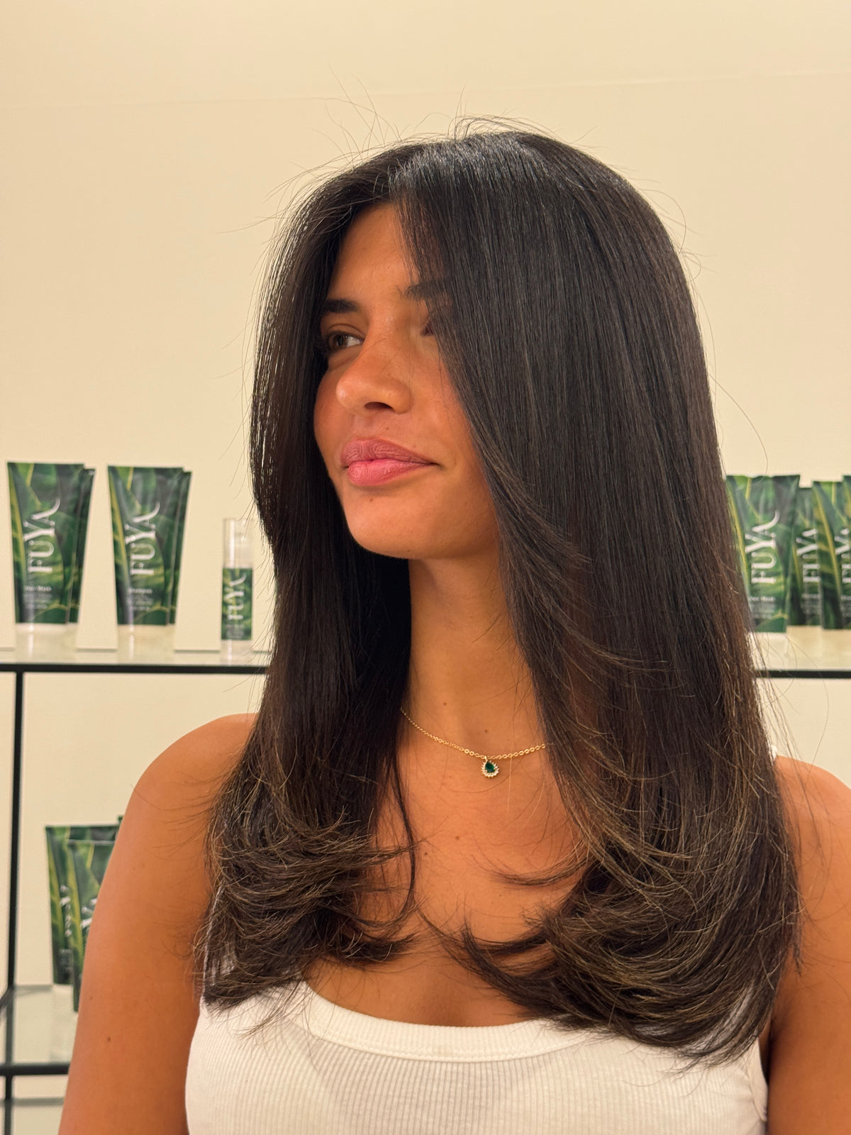 Long dark brown layered hair, smooth and shiny
