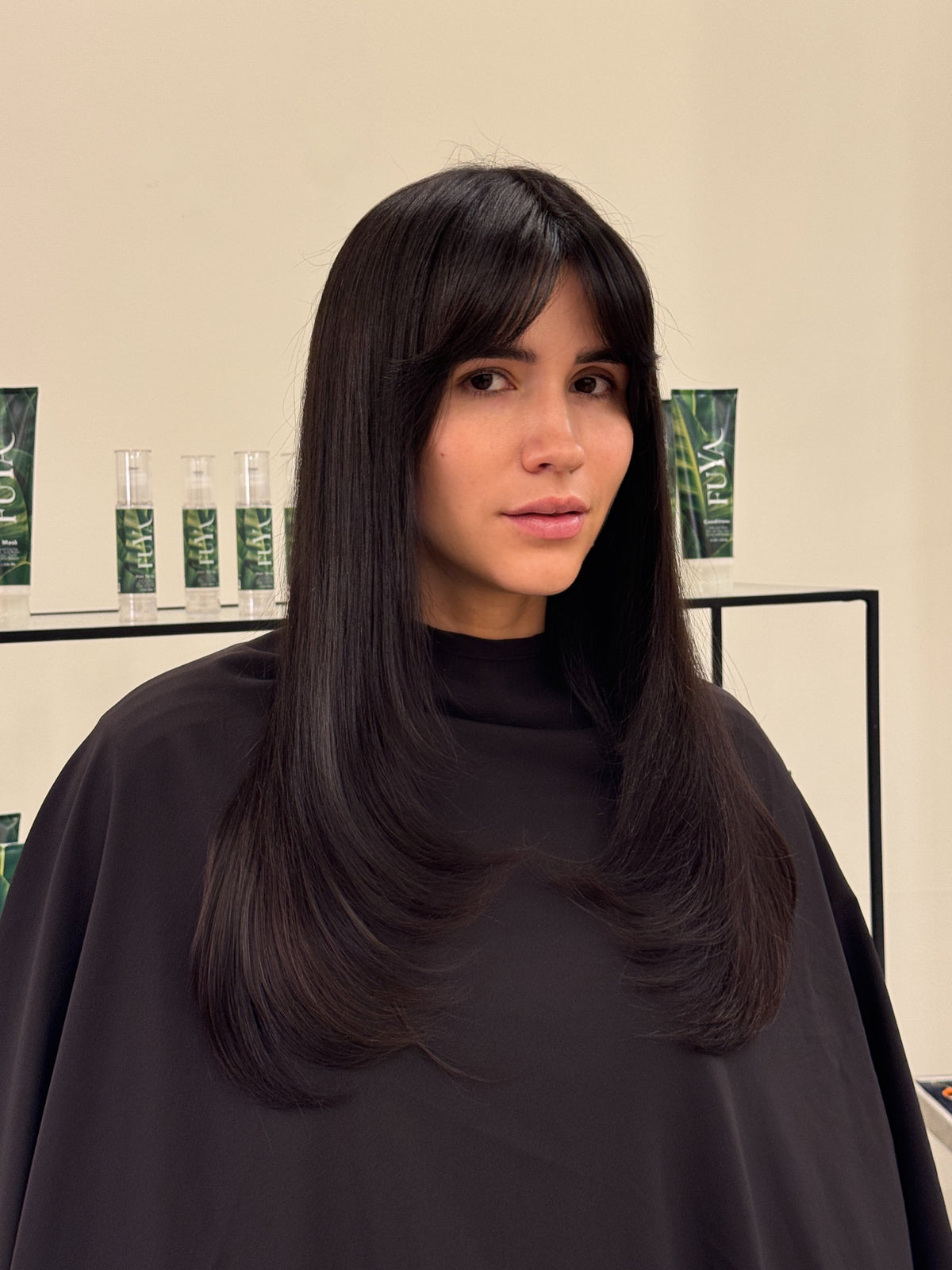 Long black hair with full bangs
