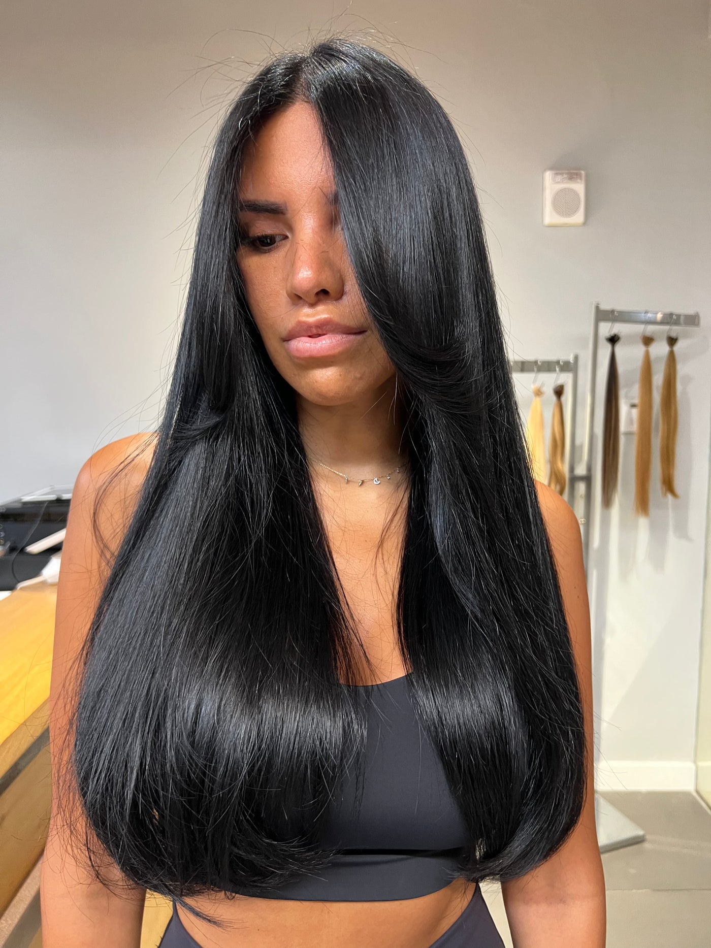 Long, sleek glossy black hair, front view