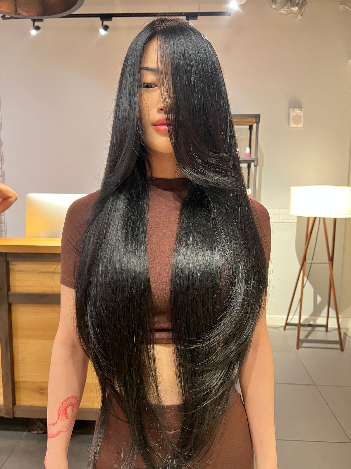 Very long, straight black hair after a Brazilian blowout